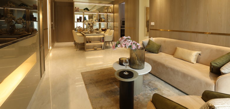 Bright luxurious living–dining area of a Runwal Lands 1 bhk apartment in Thane with contemporary furniture and soft lighting.